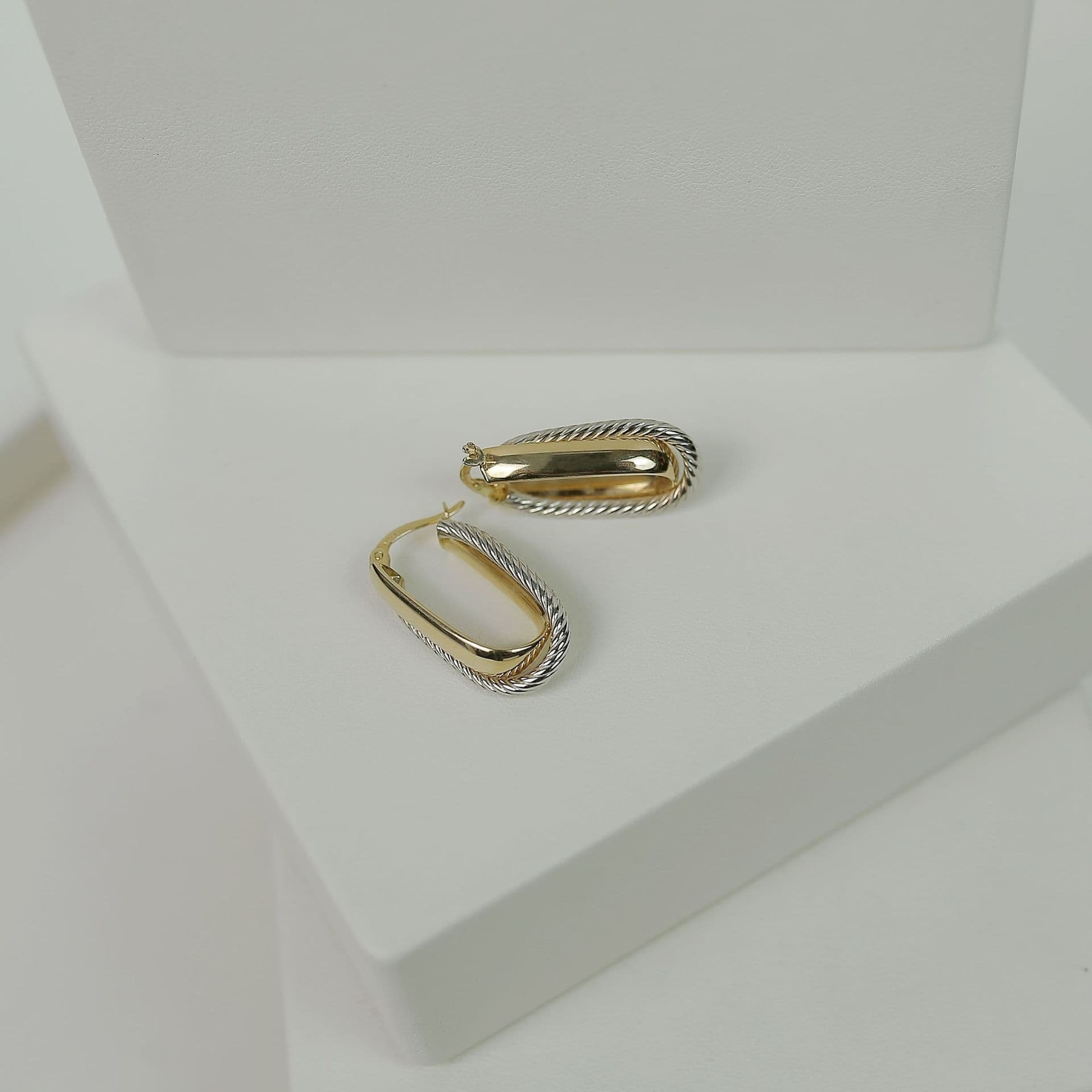 Oval gold earrings