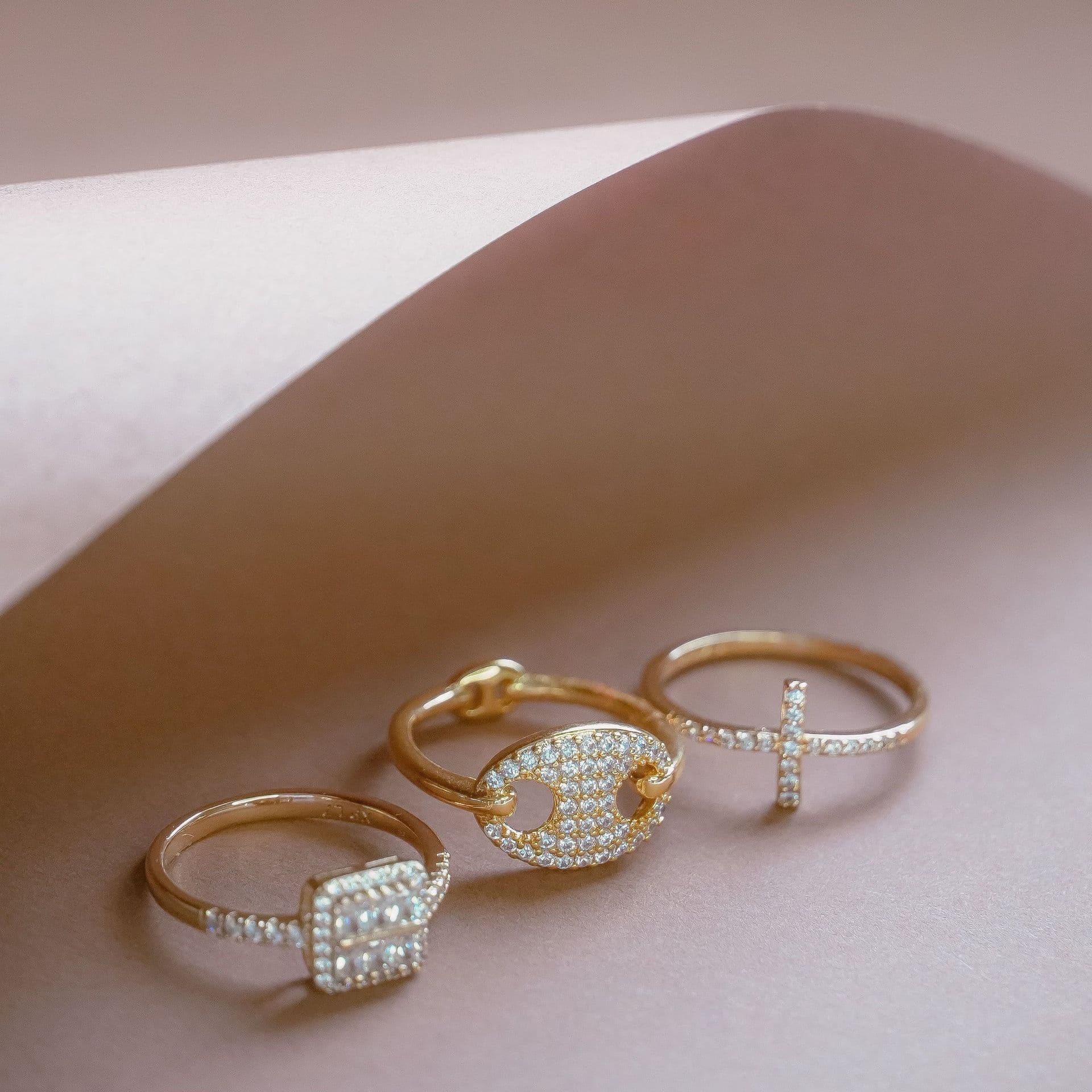 Three thin stackable gold rings