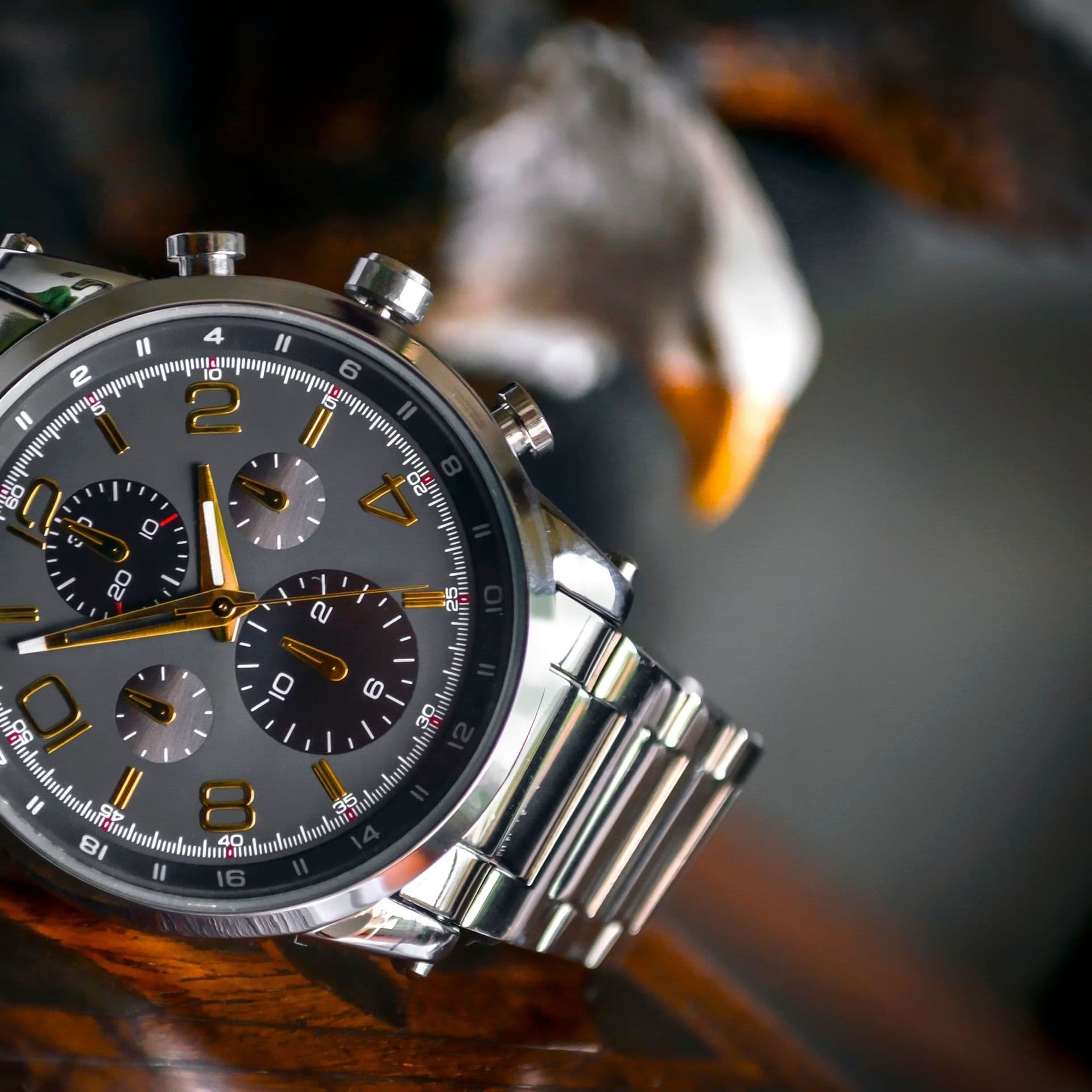 A steel chronograph with a grey dial